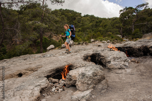 Woman walking on the rocks of the Chimaera mountain