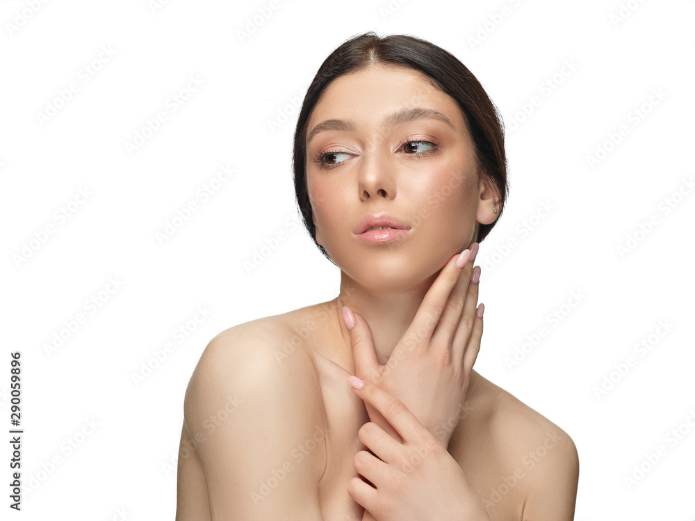 Portrait of beautiful young woman isolated on white studio background. Caucasian healthy female model looking at side, serious. Concept of women's health and beauty, self-care, body and skin care. Portrait of beautiful young woman isolated on white studio background. Caucasian healthy female model looking at side, serious. Concept of women's health and beauty, self-care, body and skin care.