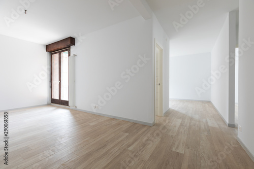 Wallpaper Mural Large empty room with white walls. Parquet Torontodigital.ca