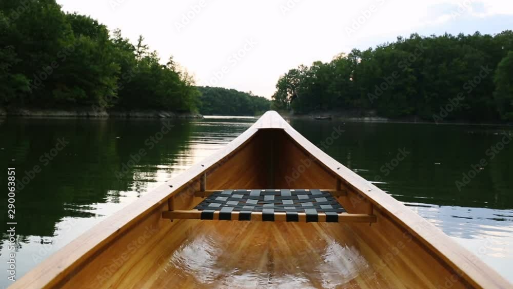 Wooden canoe bow seat and deck. Canoeing, paddling, nature, outdoors Wooden canoe bow seat and deck. Canoeing, paddling, nature, outdoors