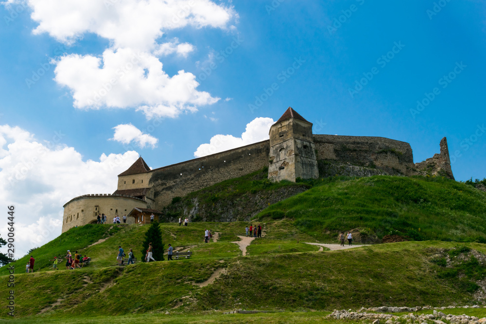 Rasnov, Brasov, Romania - June 15, 2019: Tourists visiting Rasnov Fortress on a beautifull day. Rasnov, Brasov, Romania - June 15, 2019: Tourists visiting Rasnov Fortress on a beautifull day.