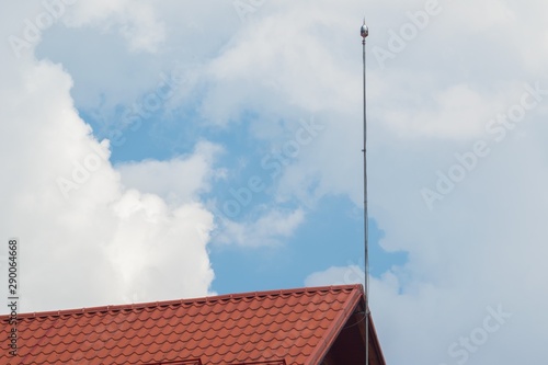 lightning protection rod installed on building roof