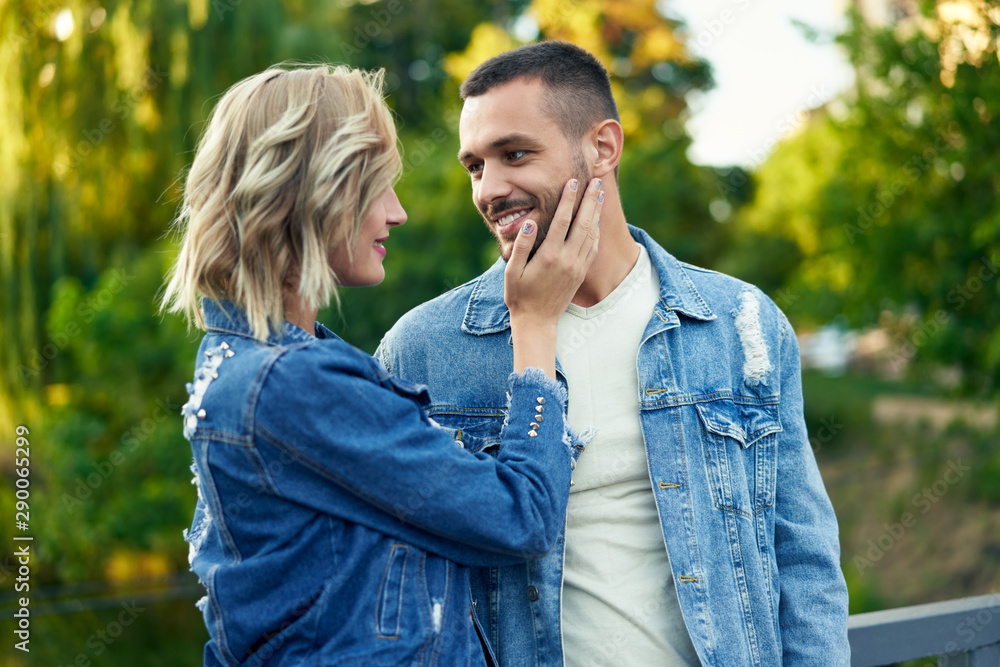 Fototapeta premium Young beautiful loving couple posing on nature