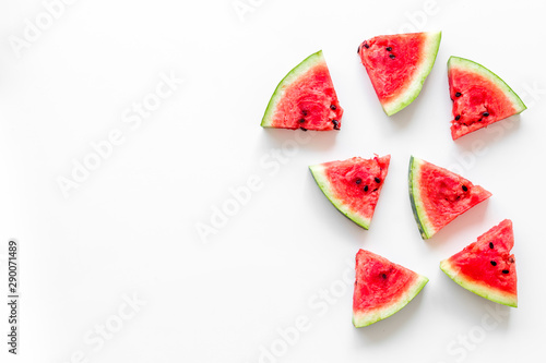 Slices of watermelon on white background top view mock up