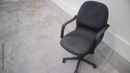 August 23, 2019 : black office chair on rooftop area in Dapenra Building, Jakarta, Indonesia