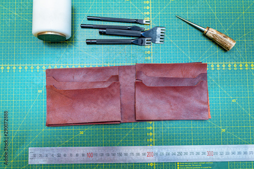 Creating sewing leather handmade wallet leathercraft. Pattern, tools, leather