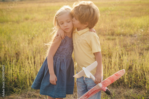 Summer holidays - love romance and people concept. Human emotions kids first love. Childhood concept. Childhood memories - First love