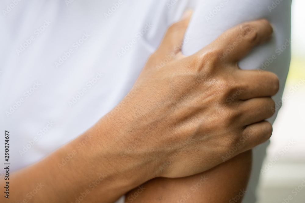 Fototapeta premium Closeup Of Woman Feeling Pain In Arm ache, , Healthcare Concept