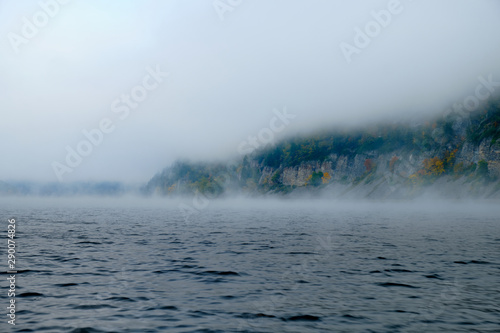 Fog on a lake in Norway in the autumn. Mist Lake mountains