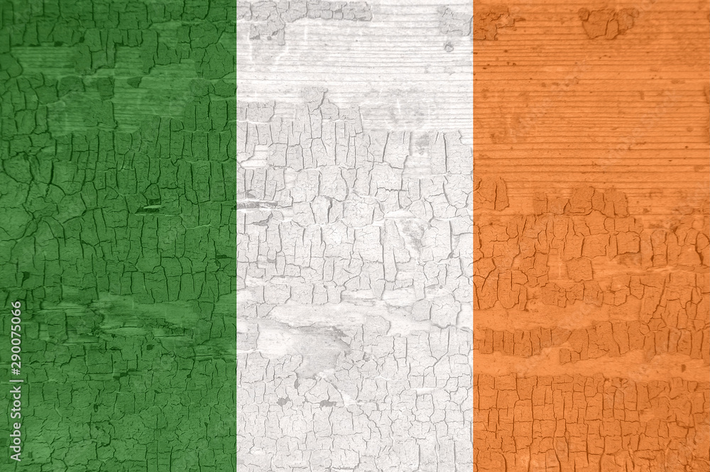 Ireland flag on an old painted tattered wooden surface. Ireland flag on an old painted tattered wooden surface.