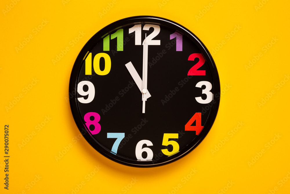 colorful wall clock show eleven o'clock colorful wall clock show eleven o'clock