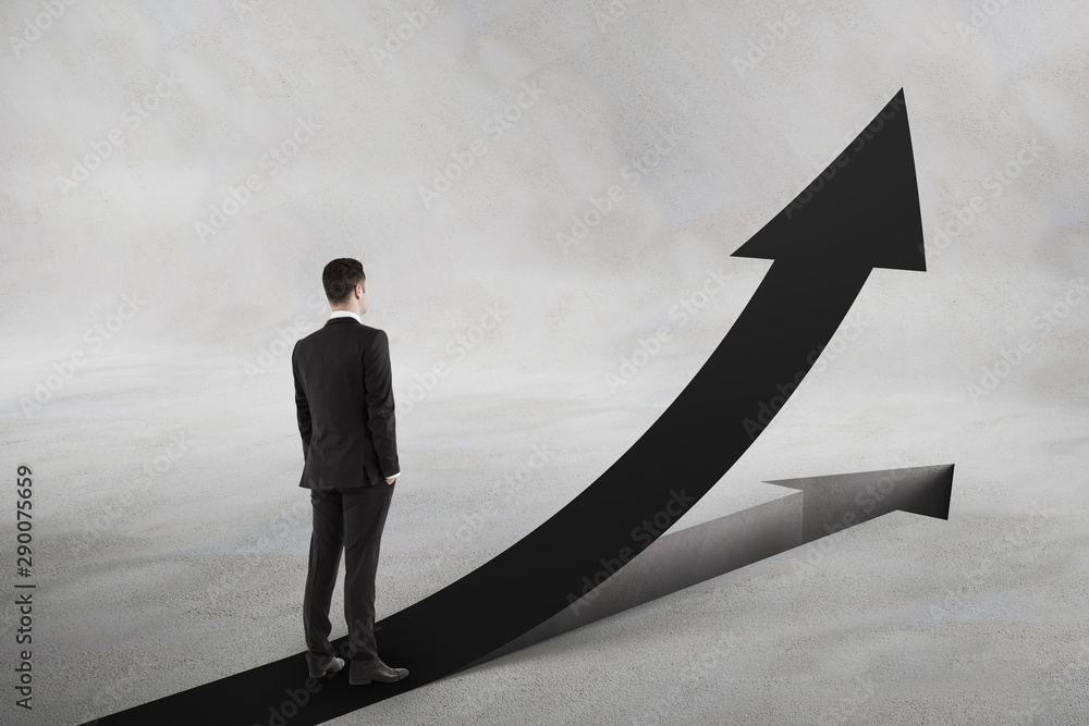 Obraz premium Personal growth and motivation concept with businessman looking at black upward road-arrow.