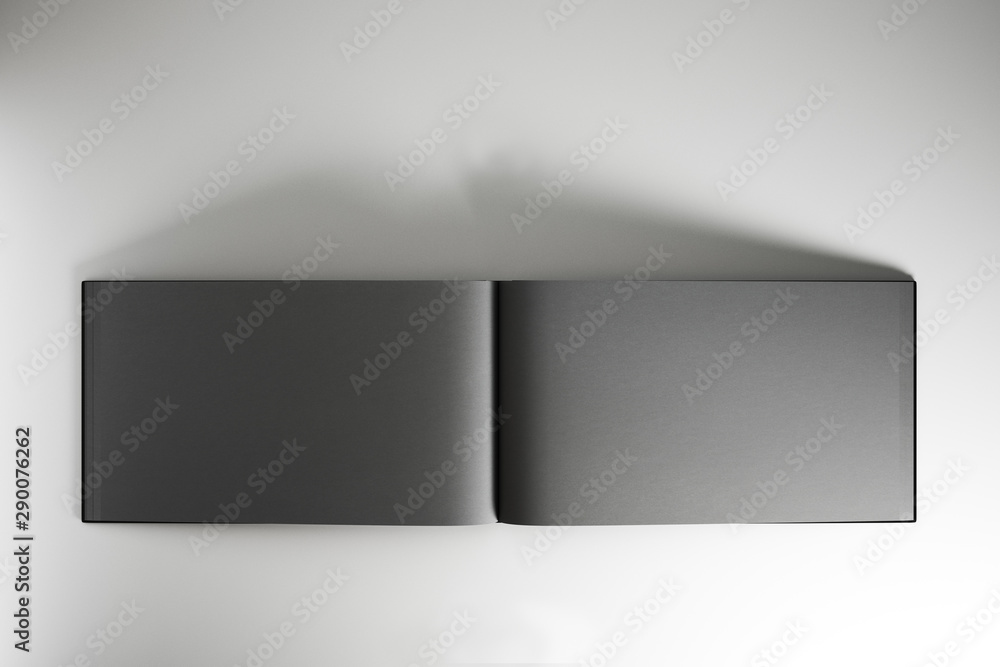 Blank black sheets of open notebook or album at abstract light background, copyspace. Blank black sheets of open notebook or album at abstract light background, copyspace.