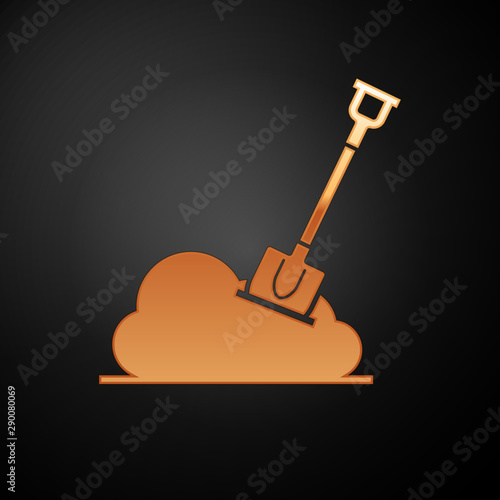 Gold Shovel in the ground icon isolated on black background. Gardening tool. Tool for horticulture, agriculture, farming. Vector Illustration