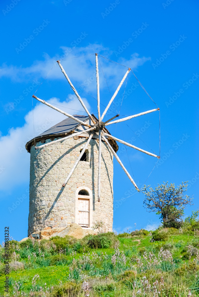 View of Windmills and Sunny sky at the hill of Foca Town in Izmir.