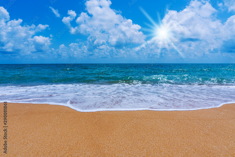 Beach with white sand and blue sea and blue sky