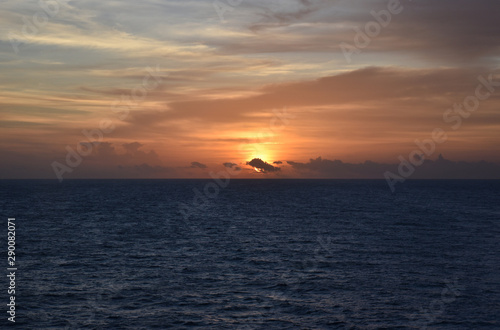 Sunset over the sea  view from the sailing ship.