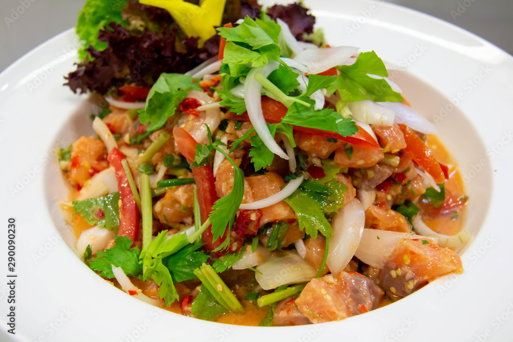  spicy salmon Thai salad on white plate