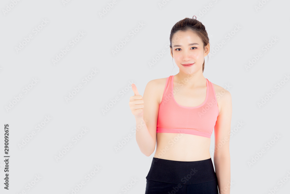 Beautiful portrait young asian woman in sport clothes with satisfied and confident gesture thumbs up isolated on white background, asia girl have shape and wellness, exercise for fit with health. Beautiful portrait young asian woman in sport clothes with satisfied and confident gesture thumbs up isolated on white background, asia girl have shape and wellness, exercise for fit with health.