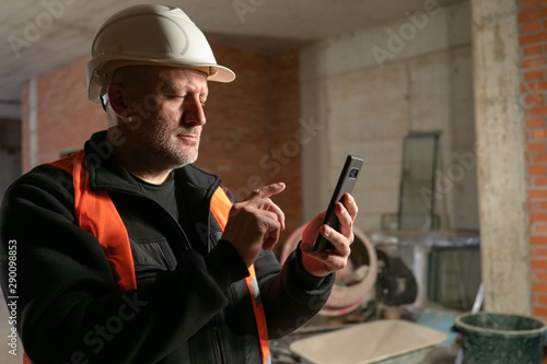 Builder on site. A man in a...