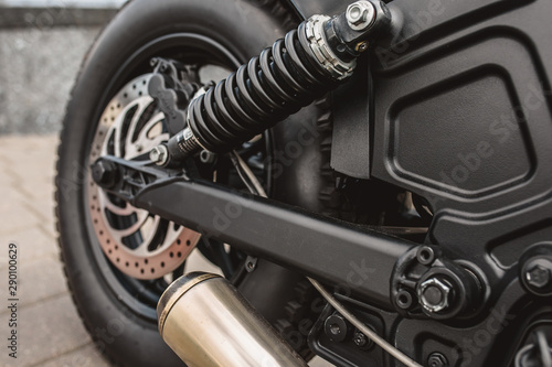 Chopper custom motorcycle rear suspension - gas shock absorber, spring and silent blocks on the levers