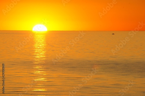Fototapeta Naklejka Na Ścianę i Meble -  Sun Setting into Lake Michigan, Michigan