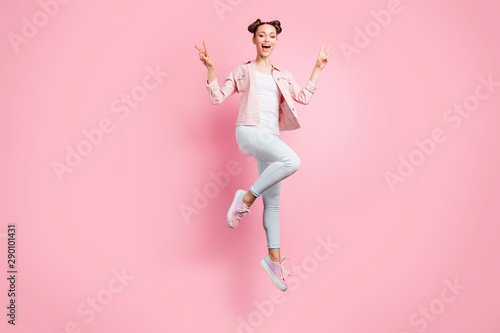 Full length body size view portrait of her she nice-looking attractive charming lovely cute cheerful cheery glad girl having fun showing double v-sign isolated over pink pastel background