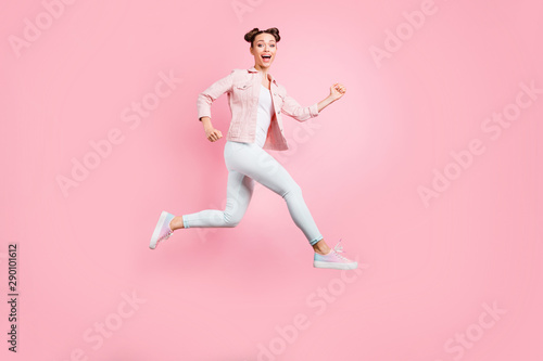 Full length body size profile side view portrait of her she nice-looking attractive charming lovely funny cheerful cheery glad positive girl running fast hobby isolated on pink pastel background