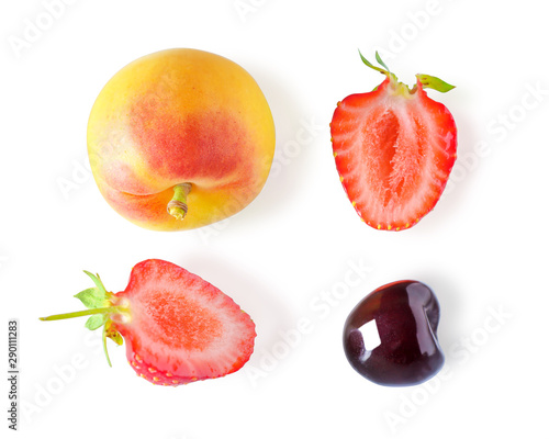 Mix of fruit, apricot, cut strawberries and cherries. Macro image of fresh ripe fruit on white isolated background.