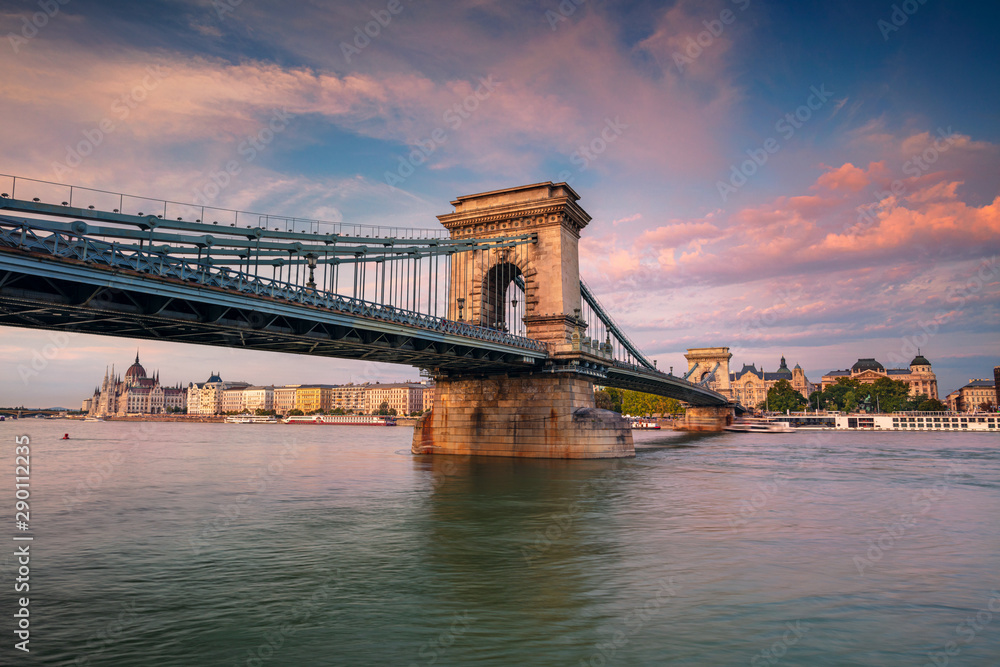 Fototapeta premium Budapest, Hungary. Cityscape image of Budapest with Chain Bridge and parliament building during summer sunset.
