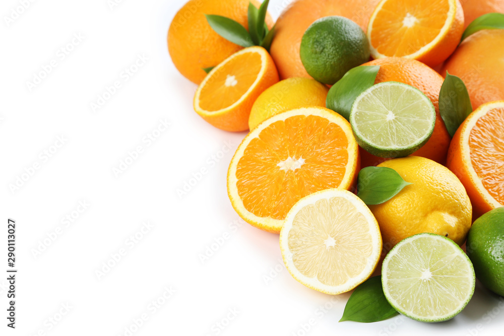 Citrus fruits with green leafs isolated on white background Citrus fruits with green leafs isolated on white background