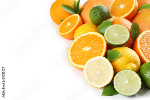 Citrus fruits with green leafs isolated on white background