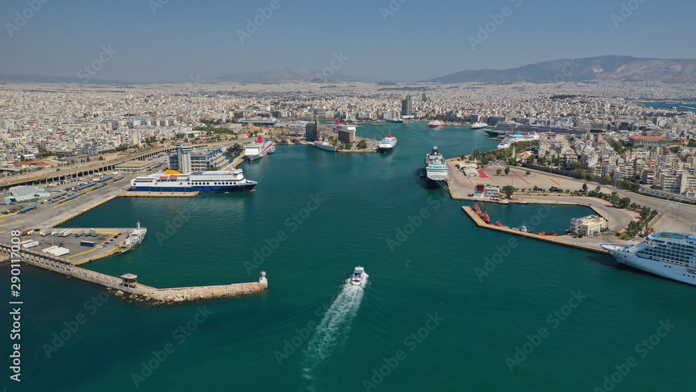 Aerial drone panoramic photo of busy port of Piraeus, the largest in Greece and one of the largest passenger ports in Europe, Attica, Greece 