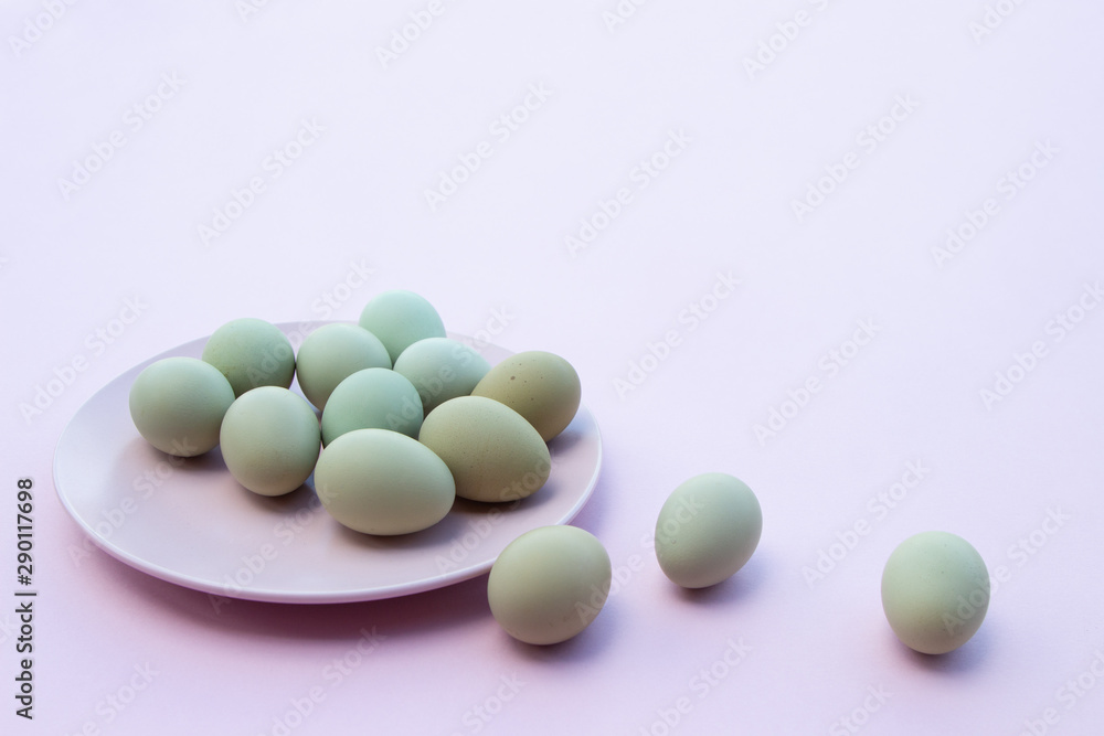 Close-up view of raw chicken eggs.Top view of eggs in bowl. Copy space.
