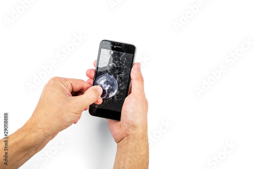 Wallpaper Mural The man replacing the broken tempered glass screen protector for smartphone Torontodigital.ca