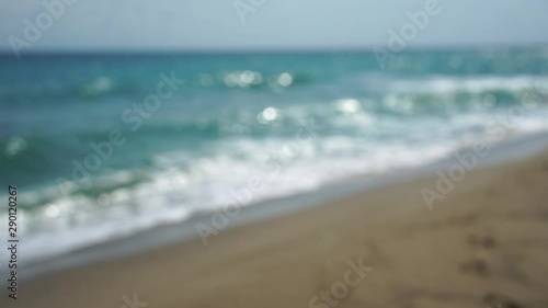 Blurred sea surface with flickering bokeh lights