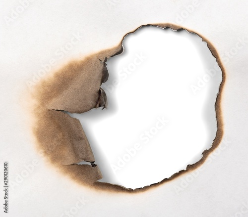 Close-Up View of a Hole in a Paper
