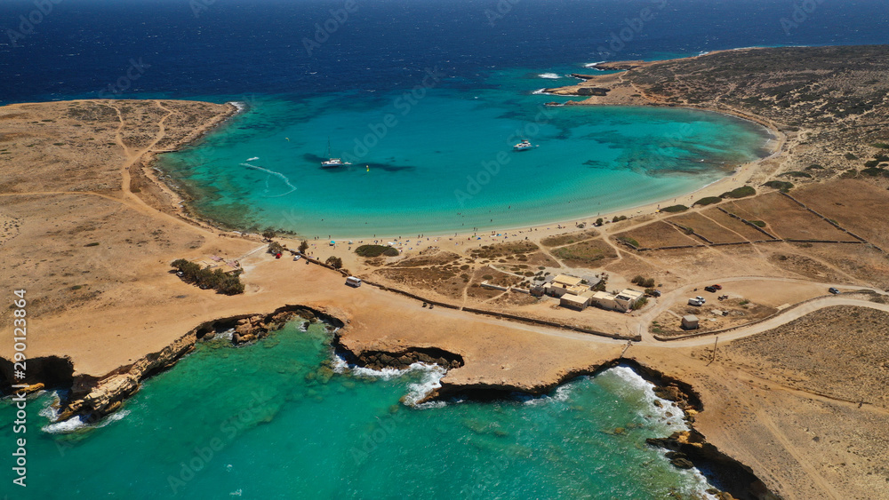 Aerial drone photo of iconic caves of Xylobatis or Ksylompatis in Koufonisi island, Small Cyclades, Greece Aerial drone photo of iconic caves of Xylobatis or Ksylompatis in Koufonisi island, Small Cyclades, Greece