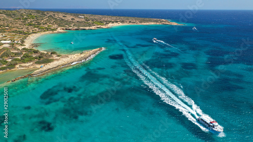 Aerial drone photo of iconic breathtaking turquoise sandy beach of Platia Pounta or Italida in famous island of Koufonissi, Small Cyclades, Greece