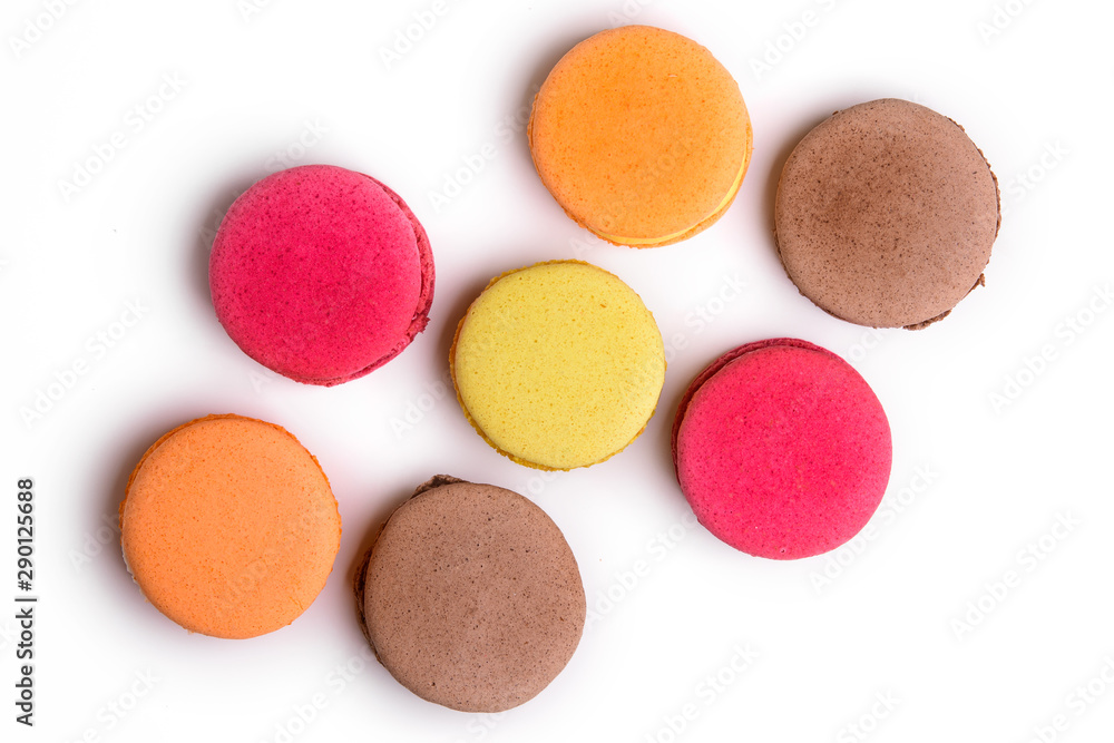 Set of colorful macarons on isolated white background. Top view Set of colorful macarons on isolated white background. Top view