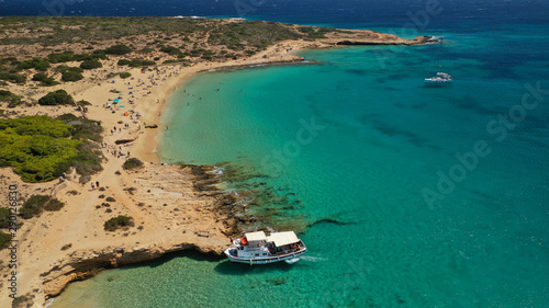 Aerial drone photo of iconic breathtaking turquoise sandy beach of Platia Pounta or Italida in famous island of Koufonissi, Small Cyclades, Greece photo