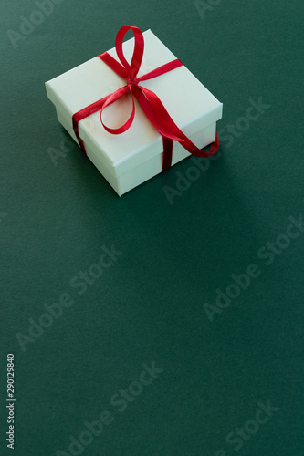 Isolated gift box on green background