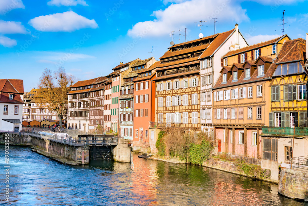 Traditional half-timbered houses on picturesque canals in La Petite France in the medieval fairytale town of Strasbourg, UNESCO World Heritage Site, Alsace, France.