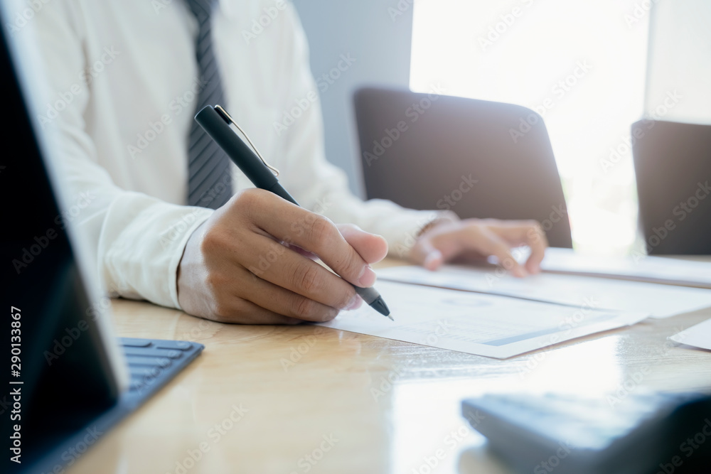 Fototapeta premium Businessman analyse investment marketing data.