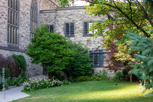 peaceful church garden with a sunlight © Nataliia