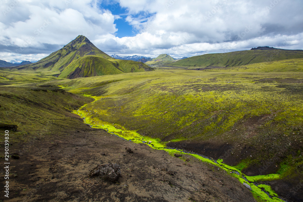 Fototapeta premium A mountain, a river, moss and volcanic ash on the trekking of Landmannalaugar, Iceland