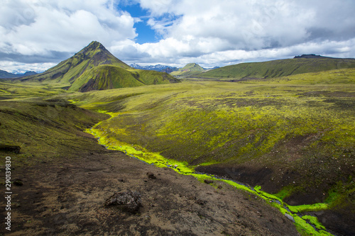 A mountain, a river, moss and volcanic ash on the trekking of Landmannalaugar, Iceland