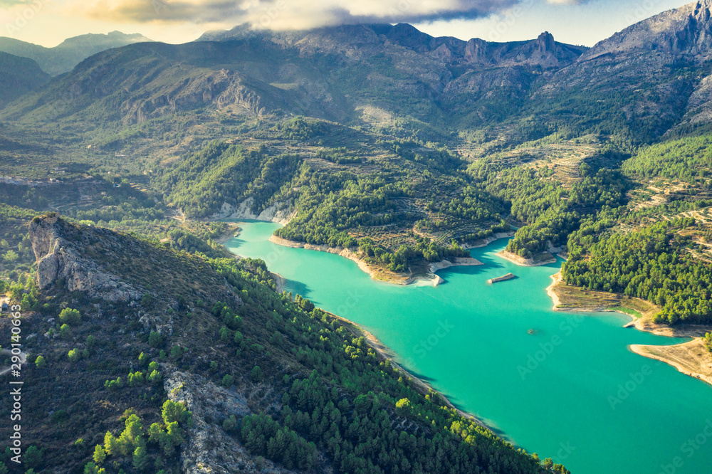 Aerial landscape shot of Guadalest Lake Valley Alicante Province Costa Blanca Spain at sunset
