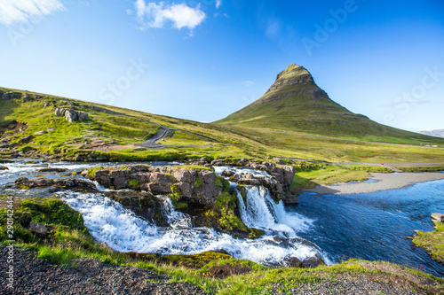 Kirkjufellsfoss  a summer morning at the waterfalls. Iceland