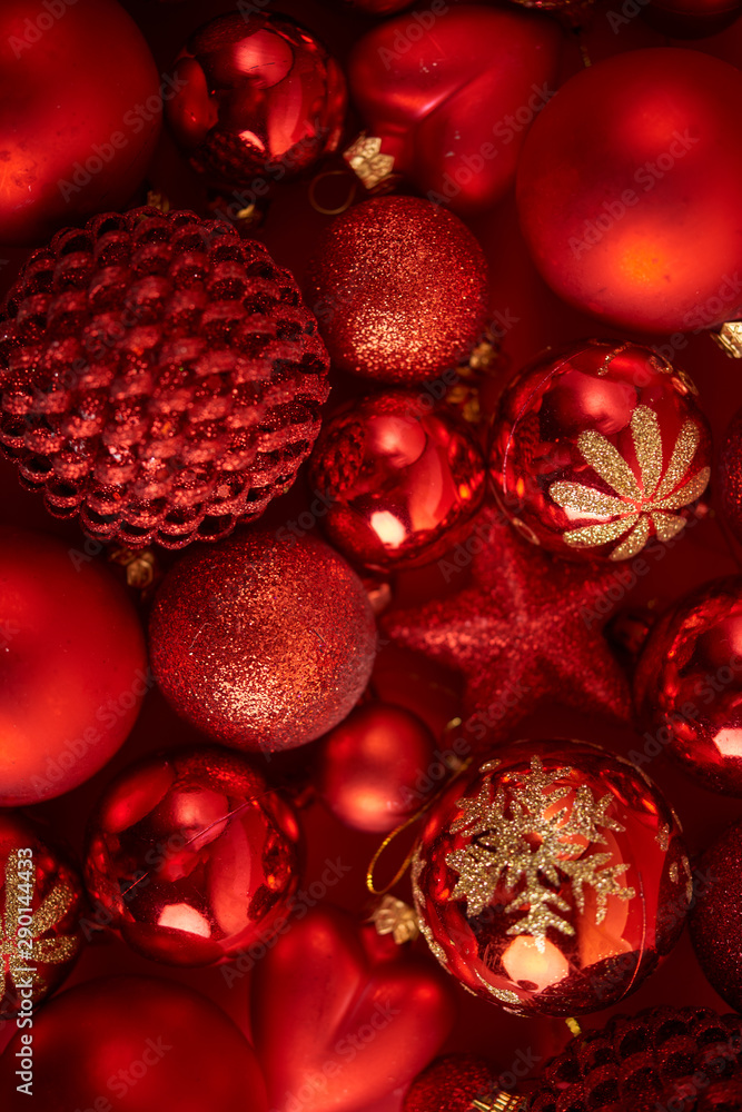 Christmas background. Set with a lot of different baubles over red background. Christmas background. Set with a lot of different baubles over red background.